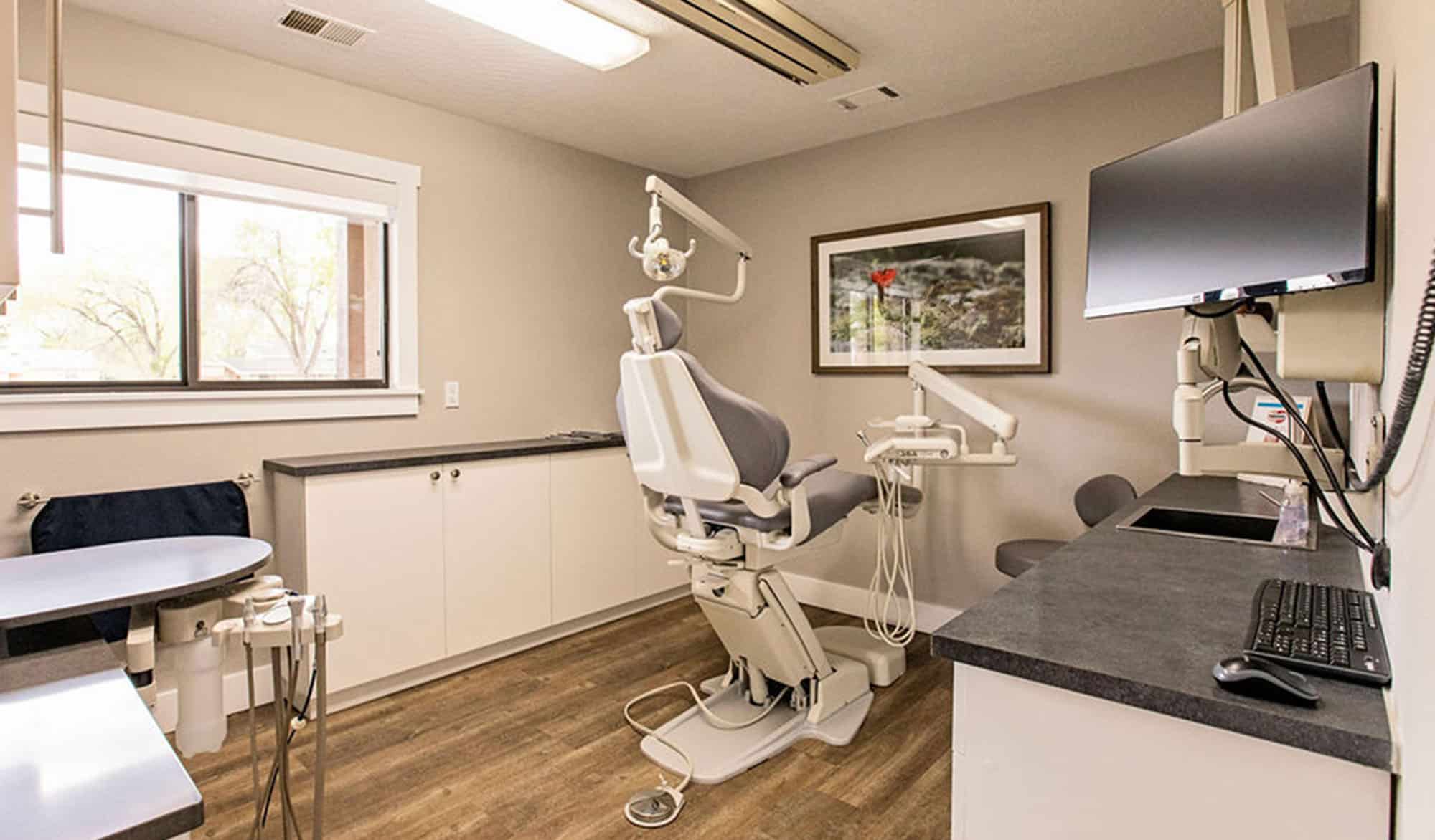 Montrose Family Dental treatment room with professional dental equipment.