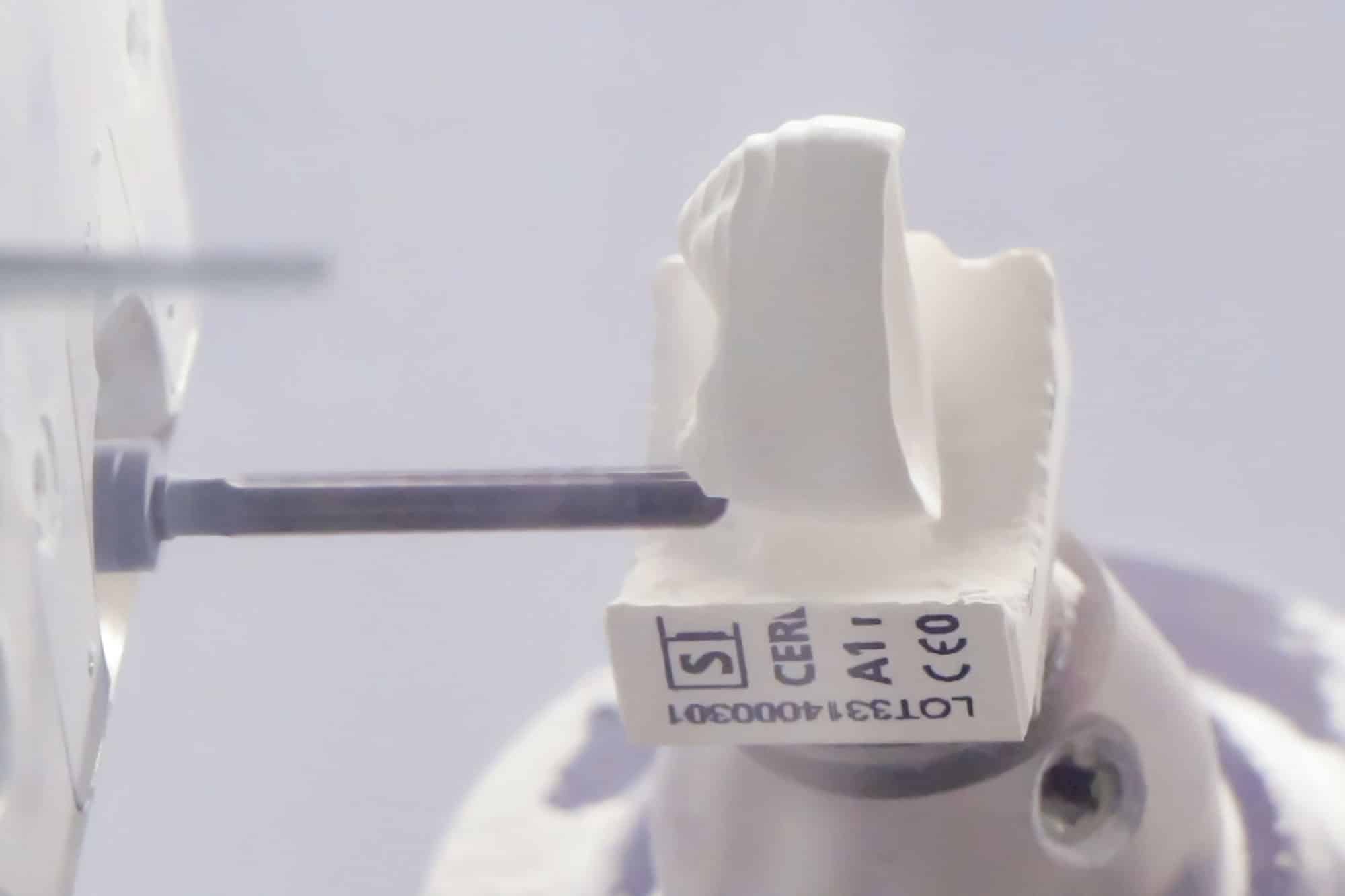 MFD Dentist Pointing at X-Ray Picture During Client Consultation