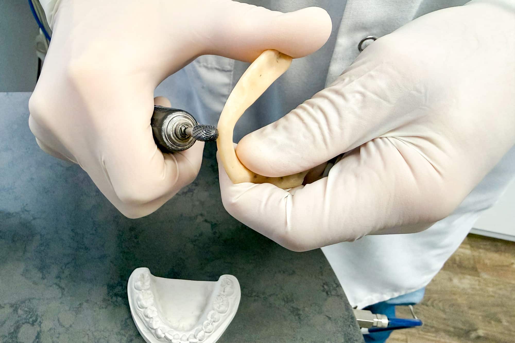 MFD Dentist Pointing at X-Ray Picture During Client Consultation